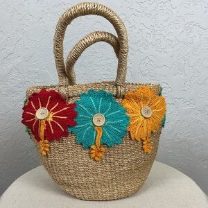 Women’s Tightly Woven Rattan Hand Bag with Crocheted Colorful Flowers